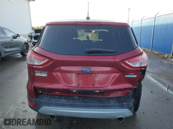 2013 Ford Escape SE with VIN 1FMCU0GX8DUB57628, listed as a Copart auction lot 51760025 with 211,083 mi miles and Salvage title. Bid and sale history available at DreamBid. Image 6.