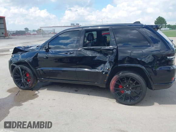 2021 Jeep Grand Cherokee Laredo X with VIN 1C4RJFAG2MC516111, listed as a IAAI auction lot 42222439 with 60,888 mi miles and . Bid and sale history available at DreamBid. Image 14.
