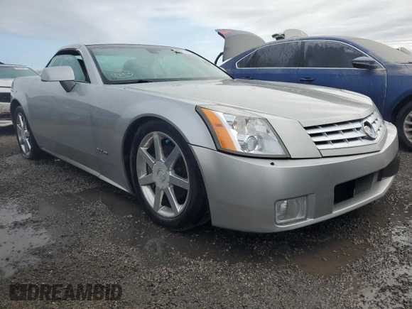 2004 Cadillac XLR z VIN 1G6YV34A545602056, wystawiony jako Copart lot #66506514 z przebiegiem Nie podano mil oraz Nie do naprawy • Non repairable. Historia ofert i sprzedaży dostępna na DreamBid. Obrazek 4.