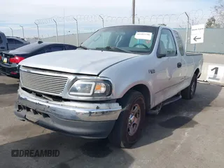 2002 Ford F-150 XL with VIN 1FTRX17262NB99755, listed as a IAAI auction lot 41181246 with 1 mi miles. Bid and sale history available at carsss.com. Image 2.