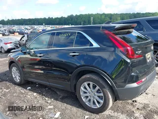 2022 Cadillac XT4 FWD Luxury with VIN 1GYAZAR48NF162799, listed as a IAAI auction lot 42308957 with 19,863 mi miles and . Bid and sale history available at DreamBid. Image 14.