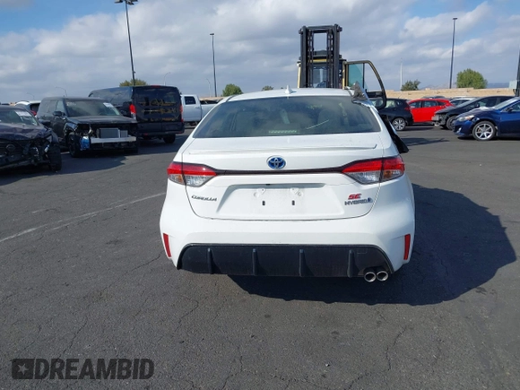 2023 Toyota Corolla Hybrid LE with VIN JTDBCMFE0P3018274, listed as a IAAI auction lot 41272268 with 24,880 mi miles. Bid and sale history available at carsss.com. Image 17.
