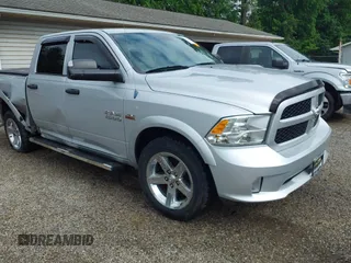 2014 Ram 1500 Express z VIN 1C6RR7KT8ES109502, wystawiony jako IAAI lot #42311032 z przebiegiem 167 695 mil mil oraz . Historia ofert i sprzedaży dostępna na DreamBid. Obrazek 1.