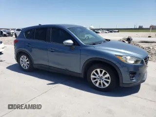 2016 Mazda CX-5 Touring with VIN JM3KE2CY3G0635643, listed as a Copart auction lot 52949105 with 179,464 mi miles and Clean Title. Bid and sale history available at carsss.com. Image 4.