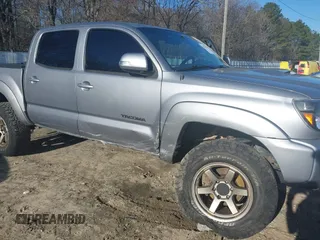 2014 Toyota Tacoma with VIN 3TMLU4ENXEM147587, listed as a IAAI auction lot 41493027 with 160,207 mi miles. Bid and sale history available at carsss.com. Image 6.