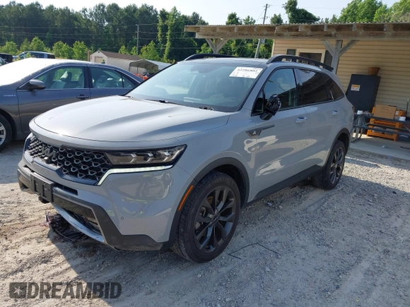 2022 Kia Sorento SX z VIN 5XYRKDLF8NG107713, wystawiony jako IAAI lot #42286802 z przebiegiem 53 718 mil mil oraz . Historia ofert i sprzedaży dostępna na DreamBid. Obrazek 19.