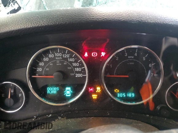2012 Jeep Wrangler Unlimited Rubicon with VIN 1C4HJWFG4CL119390, listed as a Copart auction lot 60026425 with 305,189 mi miles and Salvage title. Bid and sale history available at DreamBid. Image 9.
