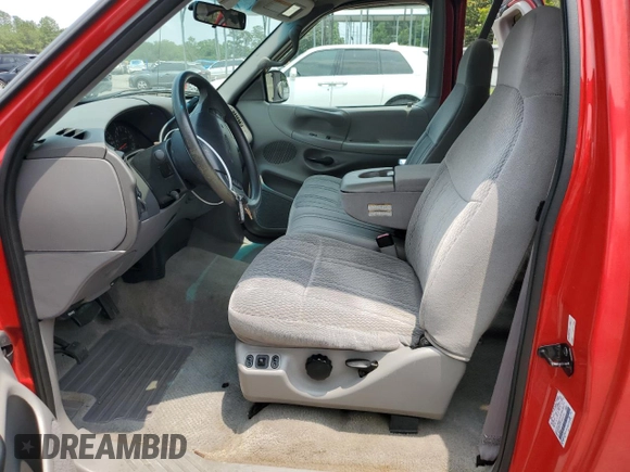 1997 Ford F-150 XL with VIN 1FTEX17L1VNB55769, listed as a Copart auction lot 58901715 with 174,234 mi miles and Salvage title. Bid and sale history available at DreamBid. Image 7.