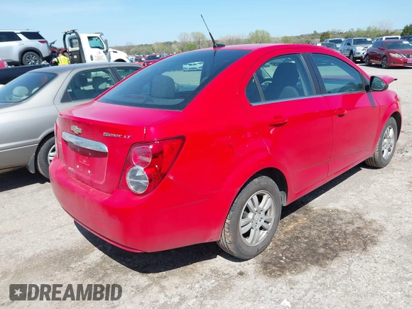 2013 Chevrolet Sonic LT with VIN 1G1JC5SH4D4218557, listed as a IAAI auction lot 41996710 with 159,962 mi miles and . Bid and sale history available at DreamBid. Image 4.