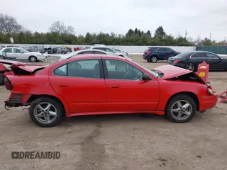 2003 Pontiac Grand Am SE1 with VIN 1G2NF52F73C226451, listed as a IAAI auction lot 41208703 with 112,479 mi miles. Bid and sale history available at carsss.com. Image 14.