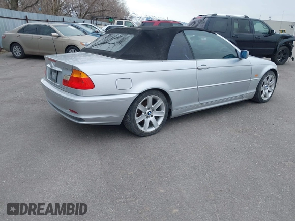 2001 BMW 3 Series 325Ci with VIN WBABS33461JY41669, listed as a IAAI auction lot 41805532 with 139,800 mi miles. Bid and sale history available at carsss.com. Image 4.