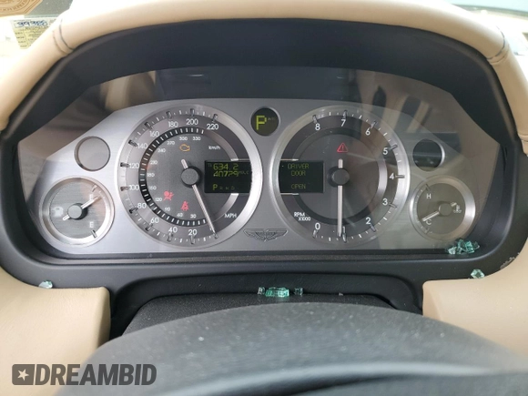 2005 Aston Martin DB9 z VIN SCFAD01A95GA02851, wystawiony jako Copart lot #63535783 z przebiegiem 40 729 mil mil oraz . Historia ofert i sprzedaży dostępna na DreamBid. Obrazek 9.