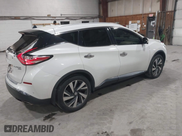2015 Nissan Murano Platinum with VIN 5N1AZ2MH0FN284971, listed as a IAAI auction lot 41825061 with 108,391 mi miles and . Bid and sale history available at DreamBid. Image 4.