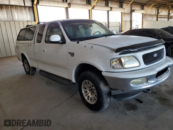 1998 Ford F-150 с VIN 1FTRX18L0WKA53124, выставлен на аукционе Copart как лот 66466945 с пробегом 252 908 миль миль и Чистый • Clean title. История ставок и продаж доступна на DreamBid. Изображение 4.