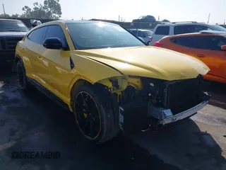 2022 Lamborghini Urus z VIN ZPBUA1ZL7NLA19290, wystawiony jako IAAI lot #41633013 z przebiegiem 17 566 mil mil oraz . Historia ofert i sprzedaży dostępna na DreamBid. Obrazek 1.