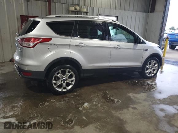 2014 Ford Escape Titanium с VIN 1FMCU0J98EUA35069, выставлен на аукционе Copart как лот 58369635 с пробегом 92 323 миль миль и Списание • Salvage title. История ставок и продаж доступна на DreamBid. Изображение 3.
