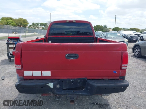 2002 Dodge Dakota Sport with VIN 1B7GL32X82S632091, listed as a IAAI auction lot 42091290 with 206,721 mi miles and . Bid and sale history available at carsss.com. Image 17.
