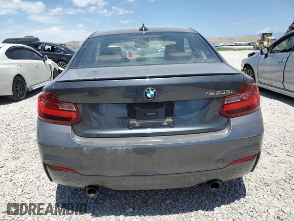 2015 BMW 2 Series M235i with VIN WBA1J7C55FV253647, listed as a Copart auction lot 60231395 with 57,639 mi miles and Salvage title. Bid and sale history available at DreamBid. Image 6.