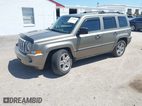 2008 Jeep Patriot Sport with VIN 1J8FT28W18D636073, listed as a IAAI auction lot 42030817 with 103,122 mi miles. Bid and sale history available at carsss.com. Image 2.
