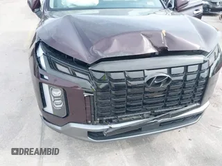 2023 Hyundai Palisade Limited z VIN KM8R54GE0PU517573, wystawiony jako IAAI lot #41870400 z przebiegiem 11 477 mil mil oraz . Historia ofert i sprzedaży dostępna na DreamBid. Obrazek 6.