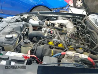 2002 Ford Mustang GT Deluxe z VIN 1FAFP42X62F227562, wystawiony jako IAAI lot #42547731 z przebiegiem 138 897 mil mil oraz . Historia ofert i sprzedaży dostępna na DreamBid. Obrazek 19.