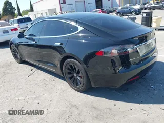 2017 Tesla Model S 100D with VIN 5YJSA1E21HF202591, listed as a IAAI auction lot 41983073 with 140,282 mi miles and . Bid and sale history available at DreamBid. Image 3.