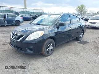 2014 Nissan Versa SV with VIN 3N1CN7AP7EL811097, listed as a IAAI auction lot 42051169 with 121,761 mi miles. Bid and sale history available at carsss.com. Image 2.