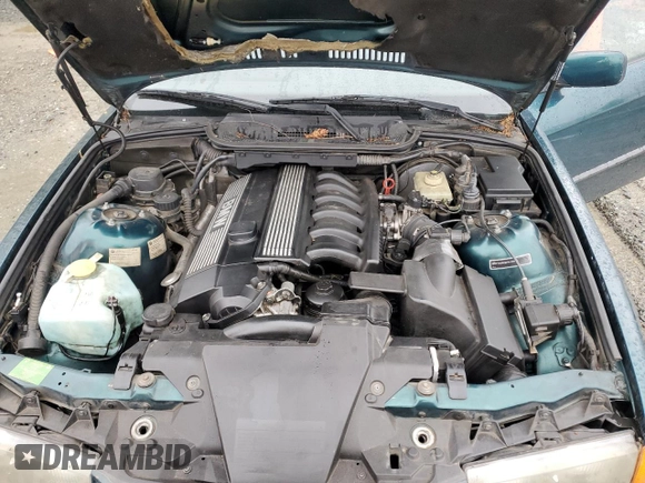 1997 BMW 3 Series 328is with VIN WBABG1320VET05383, listed as a Copart auction lot 52463975 with 236,590 mi miles and Clean Title. Bid and sale history available at carsss.com. Image 11.