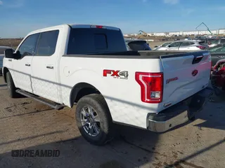 2015 Ford F-150 XLT with VIN 1FTEW1EF1FFA15054, listed as a IAAI auction lot 41780219 with 185,059 mi miles. Bid and sale history available at carsss.com. Image 3.