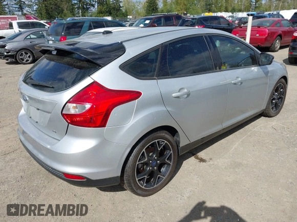 2013 Ford Focus SE with VIN 1FADP3K25DL335939, listed as a IAAI auction lot 42088780 with 149,957 mi miles. Bid and sale history available at carsss.com. Image 4.