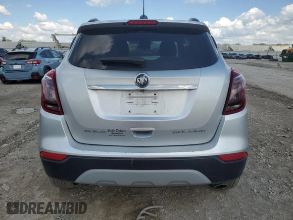 2017 Buick Encore Preferred with VIN KL4CJASB8HB224528, listed as a Copart auction lot 55347745 with 128,464 mi miles and Salvage title. Bid and sale history available at DreamBid. Image 6.