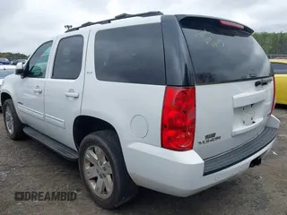 2013 GMC Yukon SLT with VIN 1GKS1CE00DR225296, listed as a IAAI auction lot 41854049 with 241,437 mi miles. Bid and sale history available at carsss.com. Image 3.