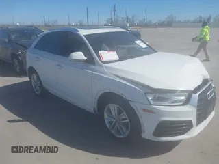 2018 Audi Q3 Premium with VIN WA1ECCFS7JR026917, listed as a IAAI auction lot 41823995 with 76,313 mi miles and . Bid and sale history available at DreamBid. Image 1.