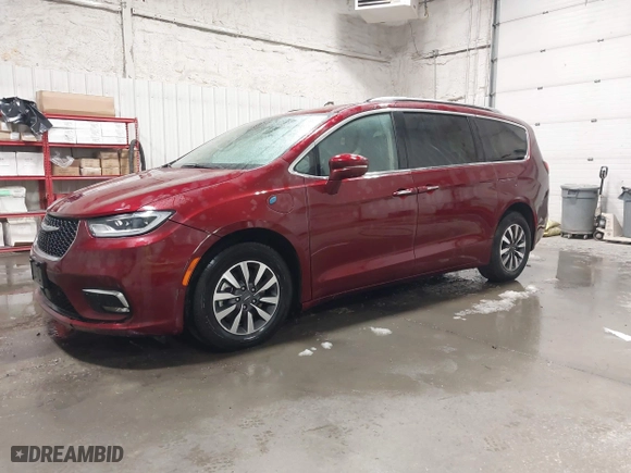 2021 Chrysler Pacifica Hybrid Touring L with VIN 2C4RC1L71MR581260, listed as a IAAI auction lot 42014401 with 68,719 mi miles. Bid and sale history available at carsss.com. Image 17.