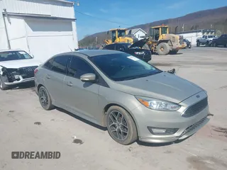 2015 Ford Focus SE with VIN 1FADP3F24FL260387, listed as a IAAI auction lot 41990194 with 80,673 mi miles. Bid and sale history available at carsss.com. Image 1.