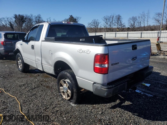 2005 Ford F-150 XL with VIN 1FTRF14535NB98598, listed as a Copart auction lot 88928675 with 214,304 mi miles and Salvage Title. Bid and sale history available at carsss.com. Image 2.