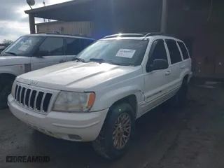 2003 Jeep Grand Cherokee Limited with VIN 1J4GW58N63C505919, listed as a IAAI auction lot 41566997 with 233,827 mi miles. Bid and sale history available at carsss.com. Image 2.