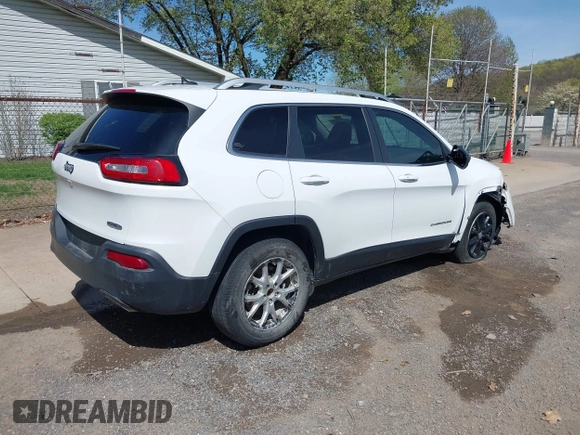 2015 Jeep Cherokee Latitude with VIN 1C4PJLCS3FW670254, listed as a IAAI auction lot 42060659 with 164,291 mi miles. Bid and sale history available at carsss.com. Image 4.