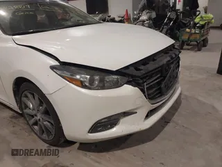 2018 Mazda 3 Touring z VIN 3MZBN1V32JM188650, wystawiony jako IAAI lot #41428819 z przebiegiem 225 611 mil mil oraz . Historia ofert i sprzedaży dostępna na DreamBid. Obrazek 6.