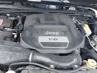2017 Jeep Wrangler Unlimited Sahara with VIN 1C4BJWEG4HL605213, listed as a IAAI auction lot 42247221 with 104,542 mi miles and . Bid and sale history available at DreamBid. Image 10.