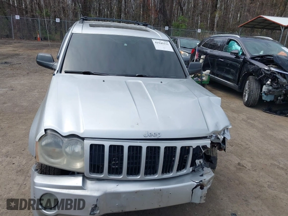 2007 Jeep Grand Cherokee Laredo with VIN 1J8HR48P77C570936, listed as a IAAI auction lot 41945531 with 200,821 mi miles. Bid and sale history available at carsss.com. Image 12.