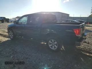2010 Nissan Titan SE with VIN 1N6BA0EK1AN312099, listed as a Copart auction lot 87882105 with 192,353 mi miles and Salvage Title. Bid and sale history available at carsss.com. Image 2.