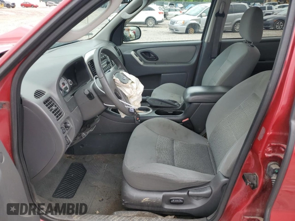 2006 Ford Escape XLT with VIN 1FMYU931X6KD09919, listed as a Copart auction lot 54403305 with 143,399 mi miles and Salvage title. Bid and sale history available at DreamBid. Image 7.