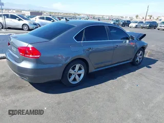 2013 Volkswagen Passat SE w/Sunroof with VIN 1VWBP7A35DC112333, listed as a IAAI auction lot 41718676 with 105,110 mi miles. Bid and sale history available at carsss.com. Image 4.