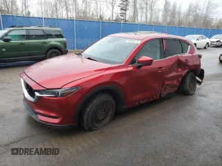 2018 Mazda CX-5 Grand Touring z VIN JM3KFBDM5J0396144, wystawiony jako Copart lot #49036715 z przebiegiem 134 640 mil mil oraz Szkoda całkowita • Salvage title. Historia ofert i sprzedaży dostępna na DreamBid. Obrazek 1.