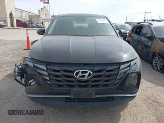 2022 Hyundai Tucson SE z VIN 5NMJACAE2NH086819, wystawiony jako IAAI lot #42050657 z przebiegiem 106 306 mil mil oraz . Historia ofert i sprzedaży dostępna na DreamBid. Obrazek 13.