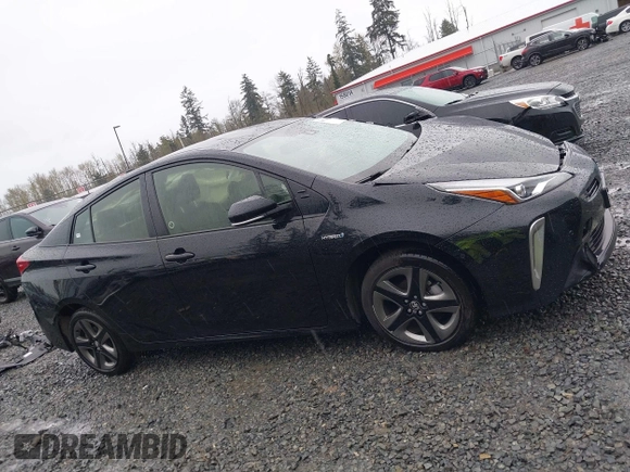 2022 Toyota Prius L Eco with VIN JTDKAMFU2N3154674, listed as a IAAI auction lot 41977505 with 61,552 mi miles and . Bid and sale history available at DreamBid. Image 14.