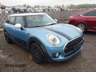 2017 MINI Clubman Cooper z VIN WMWLN5C56H2E32370, wystawiony jako IAAI lot #42159911 z przebiegiem 134 375 mil mil oraz . Historia ofert i sprzedaży dostępna na DreamBid. Obrazek 1.