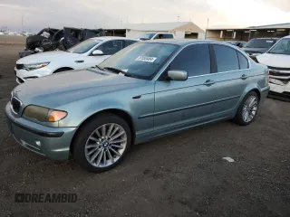 2002 BMW 3 Series 330xi with VIN WBAEW53412PG17739, listed as a Copart auction lot 87055484 with 242,929 mi miles and Salvage title. Bid and sale history available at DreamBid. Image 1.