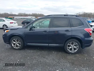 2015 Subaru Forester Touring with VIN JF2SJAWC0FH585722, listed as a IAAI auction lot 41734016 with 90,728 mi miles and . Bid and sale history available at DreamBid. Image 14.